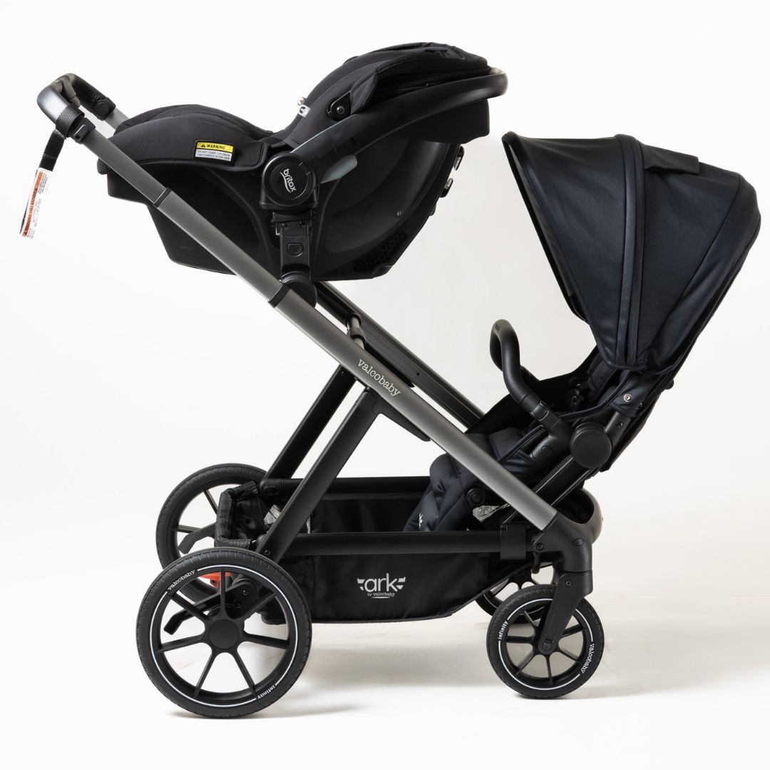Black double stroller with car seat attachment for Valcobaby Ark Multi Seat Adaptor
