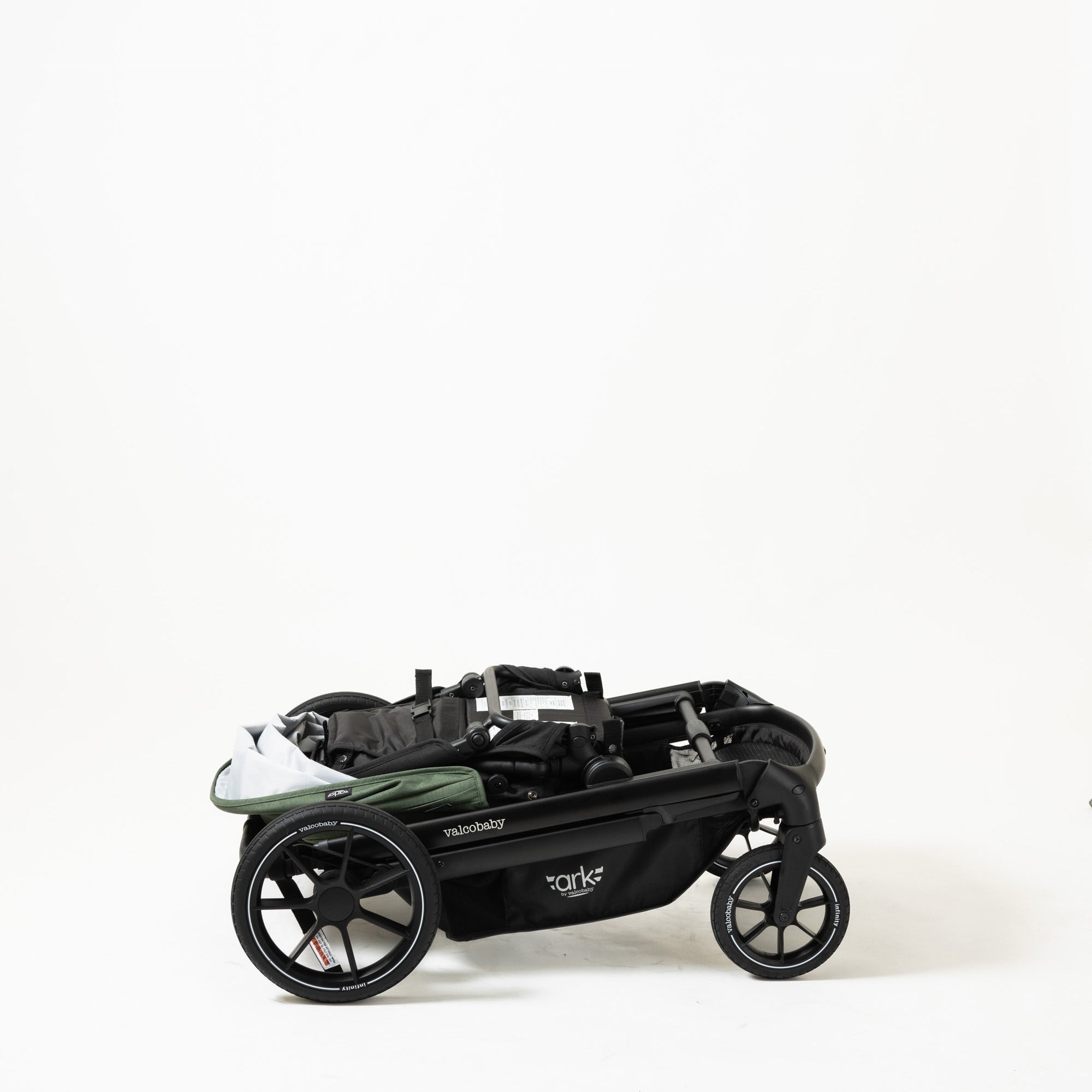 Folded black Valcobaby Ark Stroller with Toshi Baby free gift - limited time offer worth