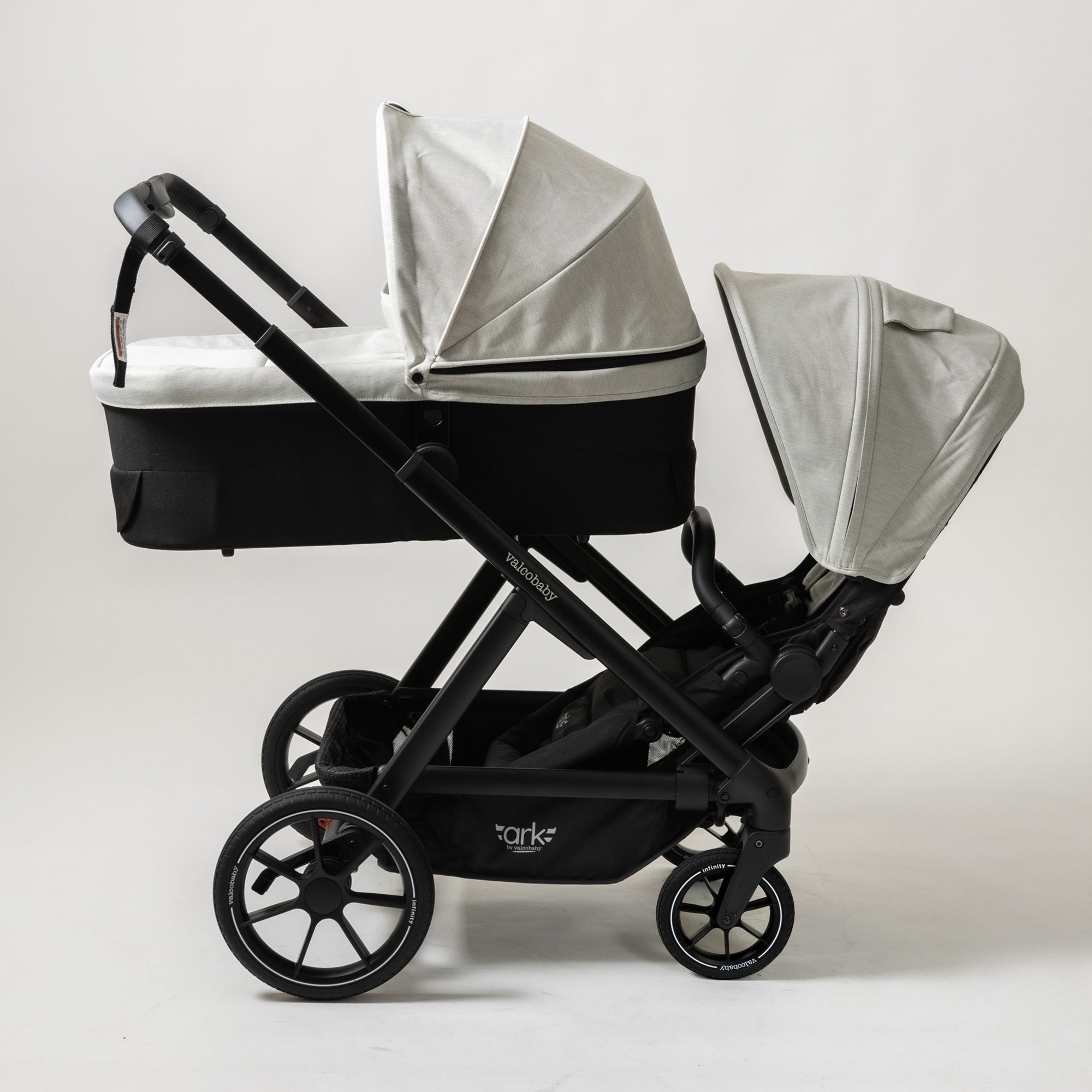 Black double stroller with gray canopies from Valcobaby Ark Stroller, includes Toshi Baby free gift in limited time offer worth