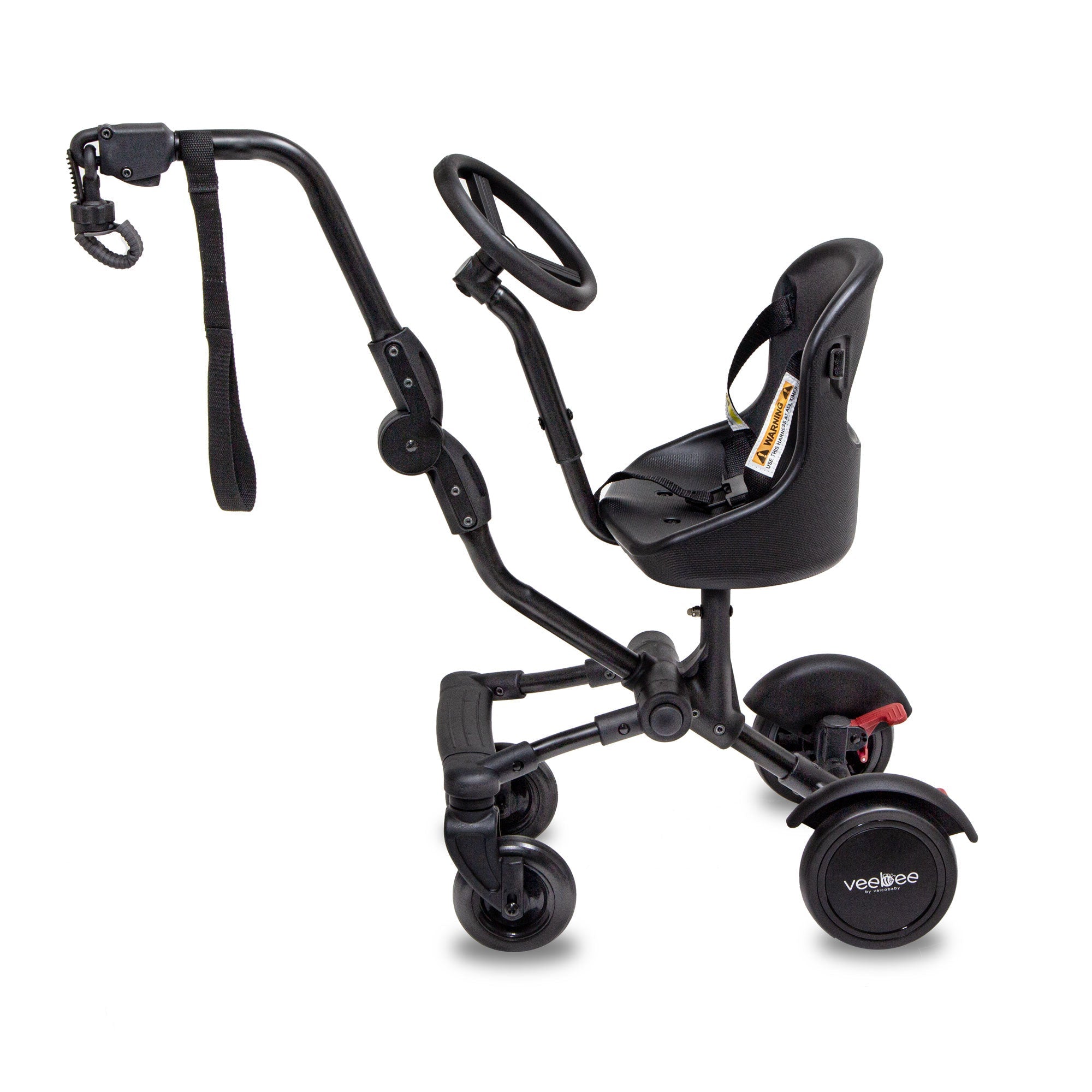 Black child’s tricycle on Vee Bee Co-Rider with Odyssey wagon wheels and versatile ride-on platform
