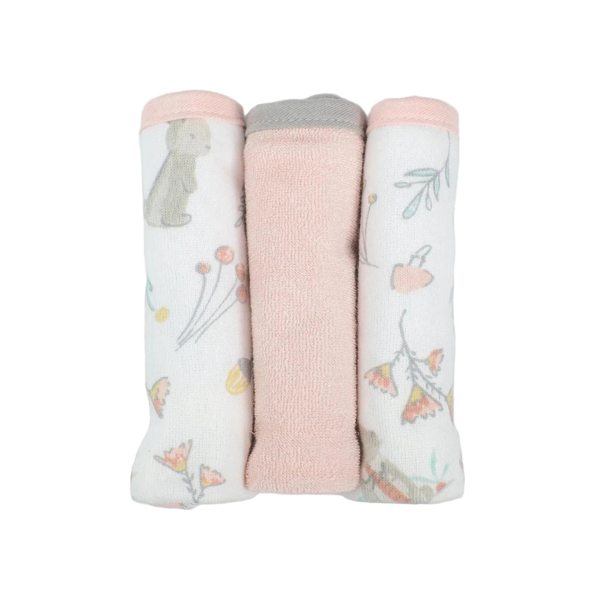 Three folded baby socks arranged side by side on a light gray background. The left and right socks are white with a soft pastel floral and butterfly print, and the center sock is a solid pale pink terry cloth.