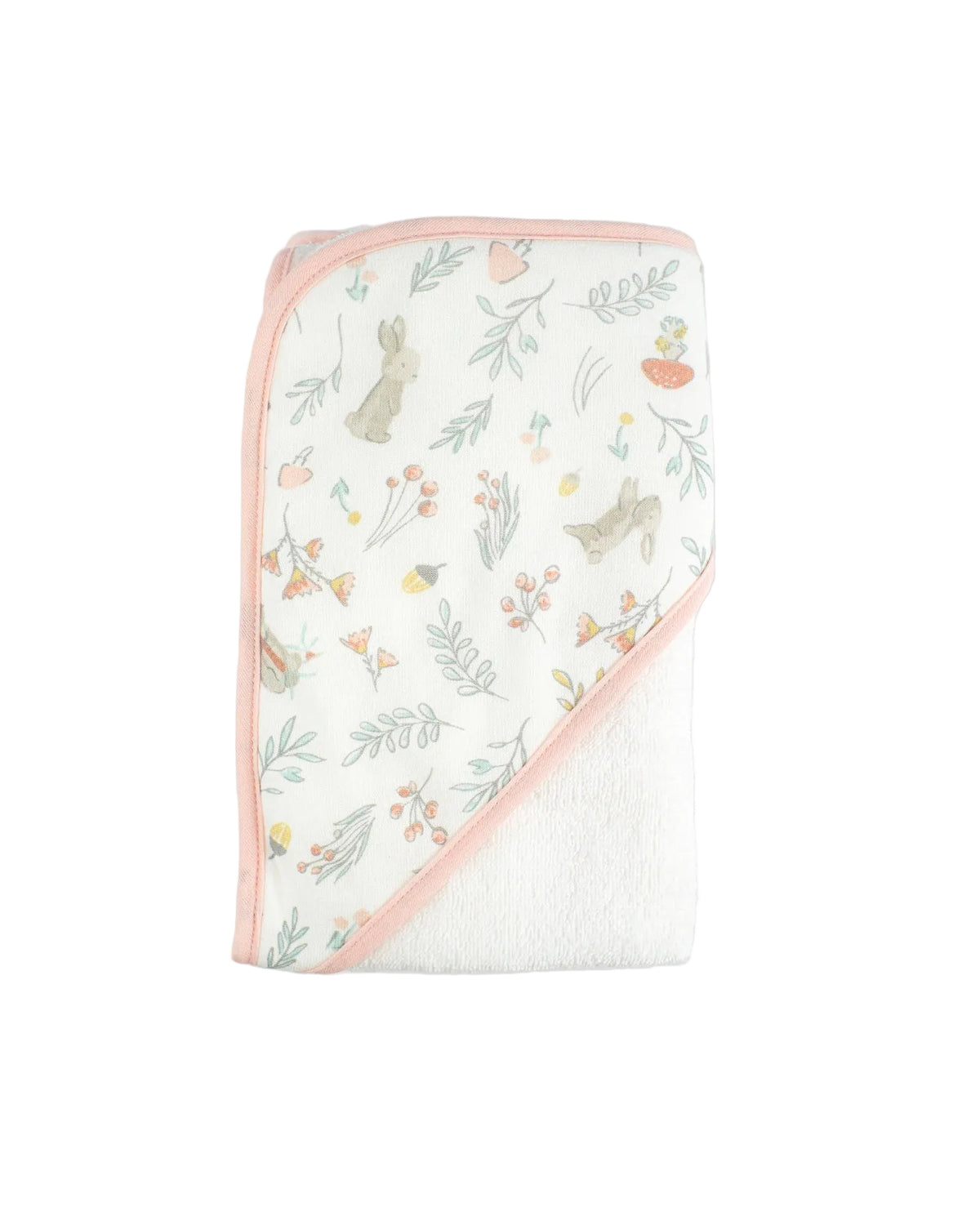 A folded baby hooded towel with a white plush reverse side and a printed front side featuring rabbits, leaves, and small flowers with a pink border, shown on a light gray background.