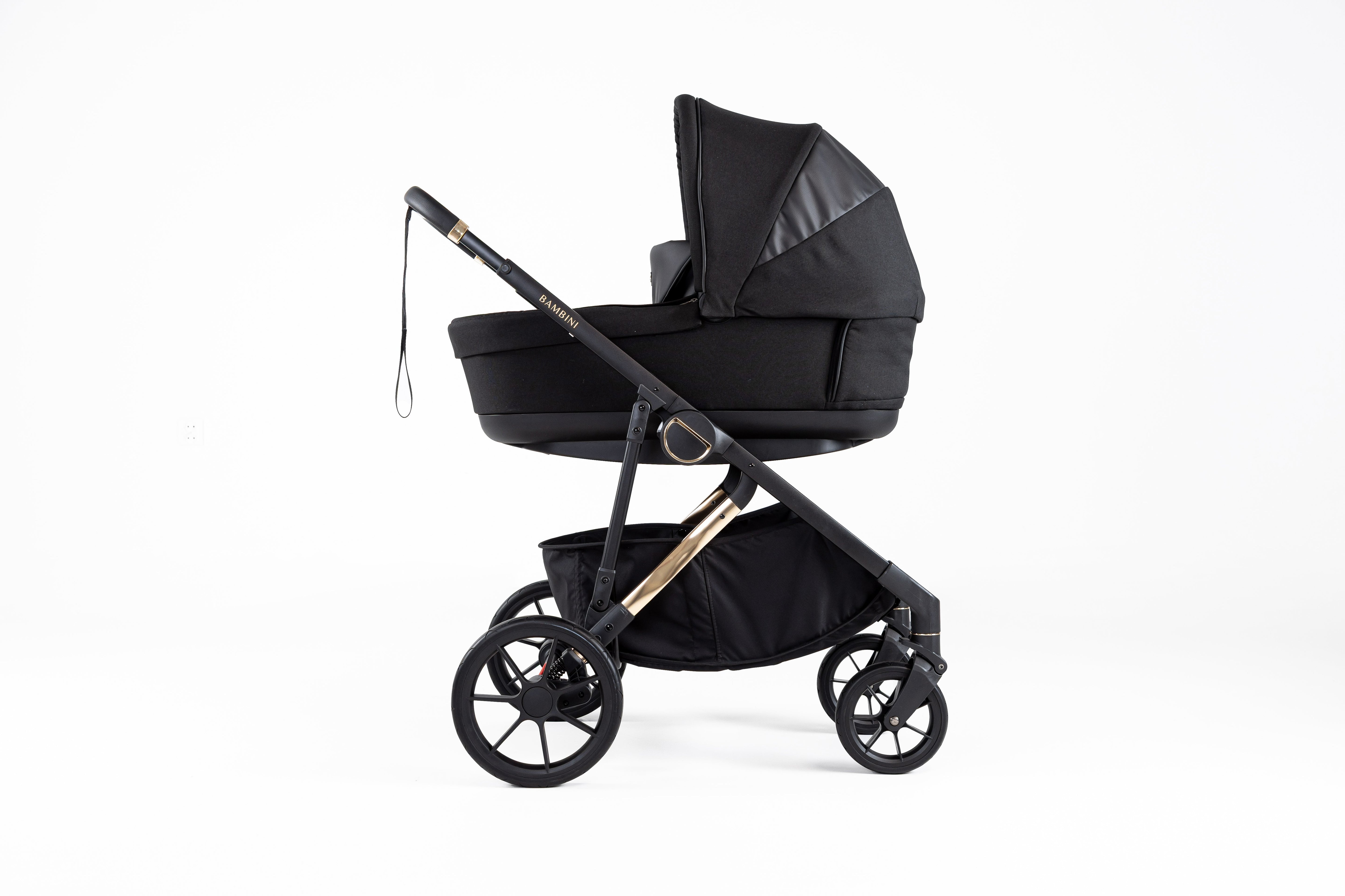Black baby stroller from Bambini Lisbon Noah Gold collection for easy city strolls