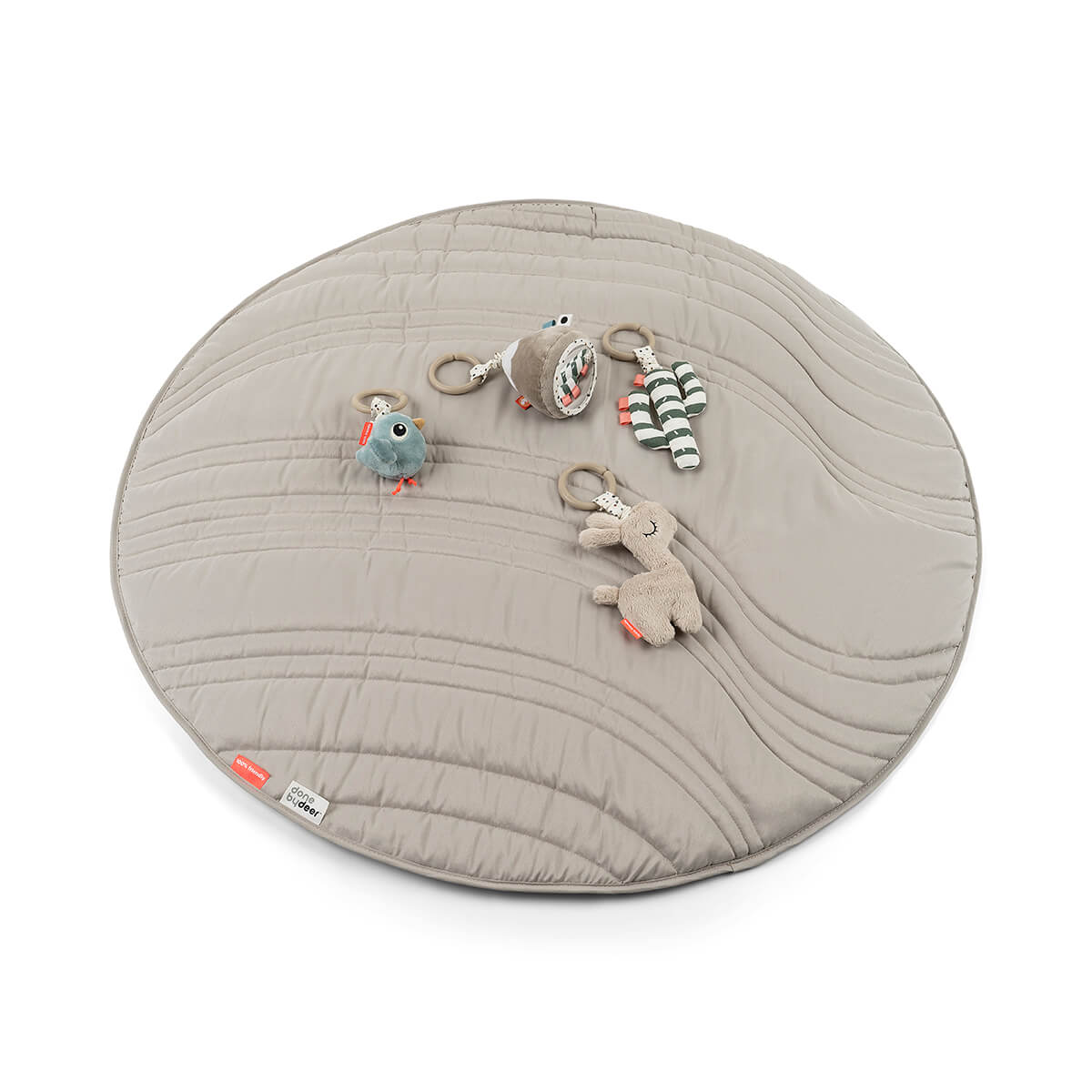 Round quilted play mat with toys from Done by Deer, perfect for Toshi baby romper fun