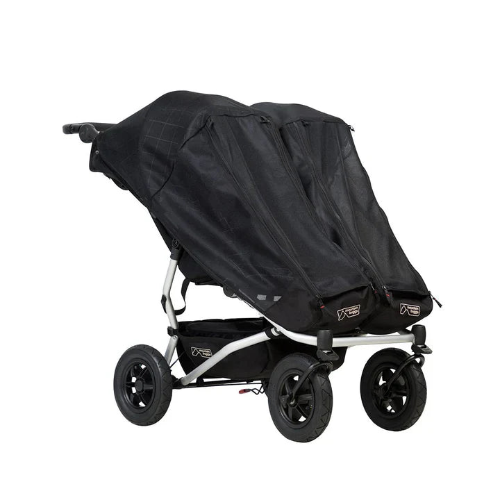 Black double stroller with Mountain Buggy Duet double sun cover for Toshi Baby