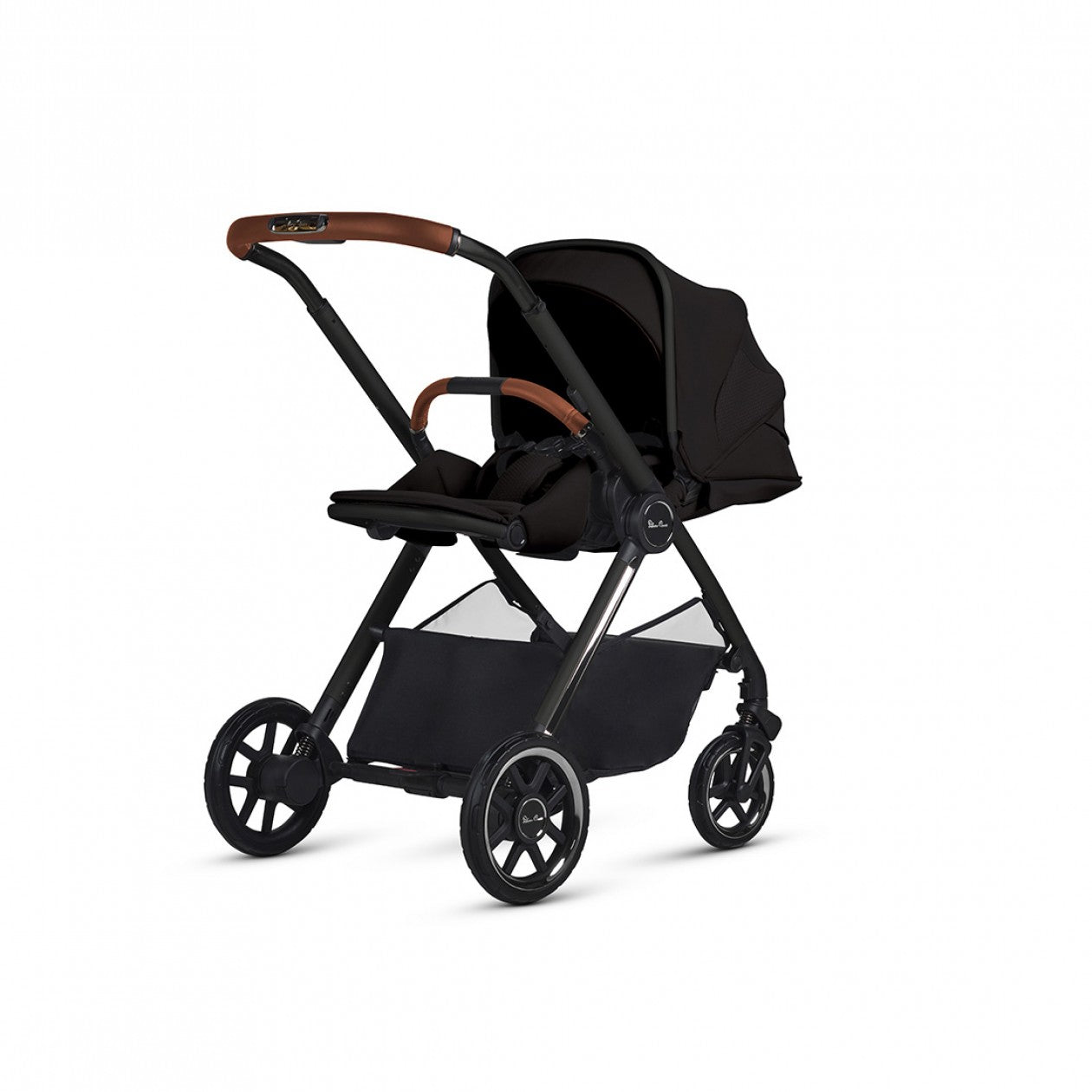 Black stroller with brown accents from Silver Cross Reef 2 Special Edition perfect with toshi baby romper