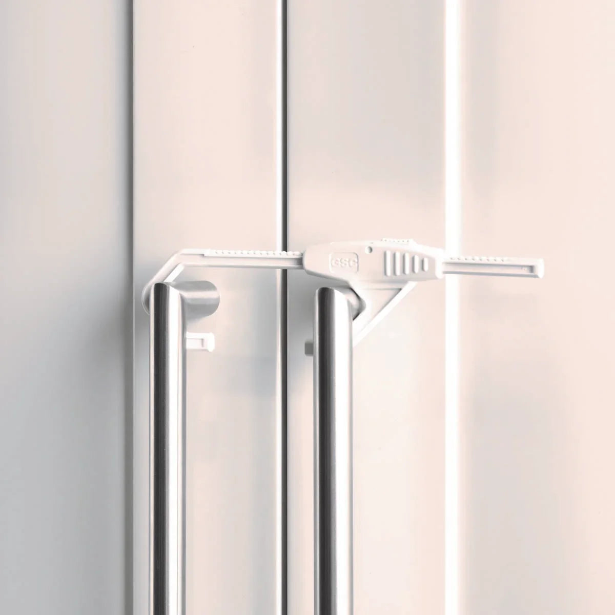 White child safety lock on refrigerator handles for Babydan Double Cabinet Slide Lock