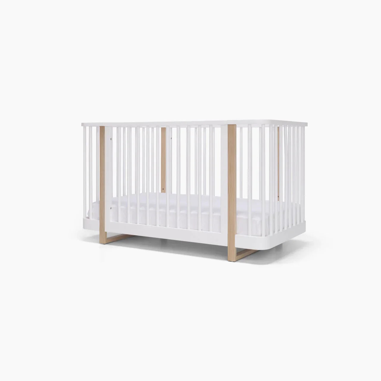 White and wood Tasman Eco Pisa cot with free standard mattress for Toshi Baby