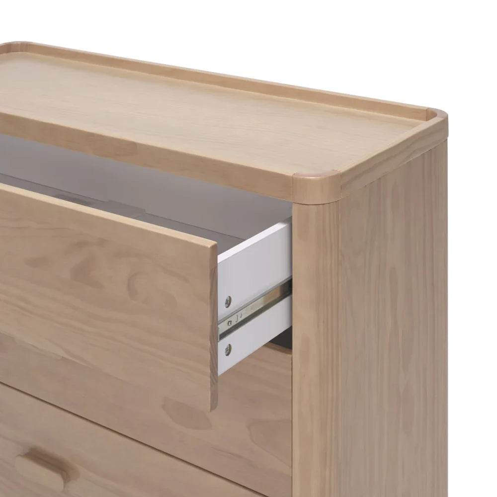 Wooden dresser with open drawer from Tasman Eco Willow fitting baby strollers and Toshi Baby gear