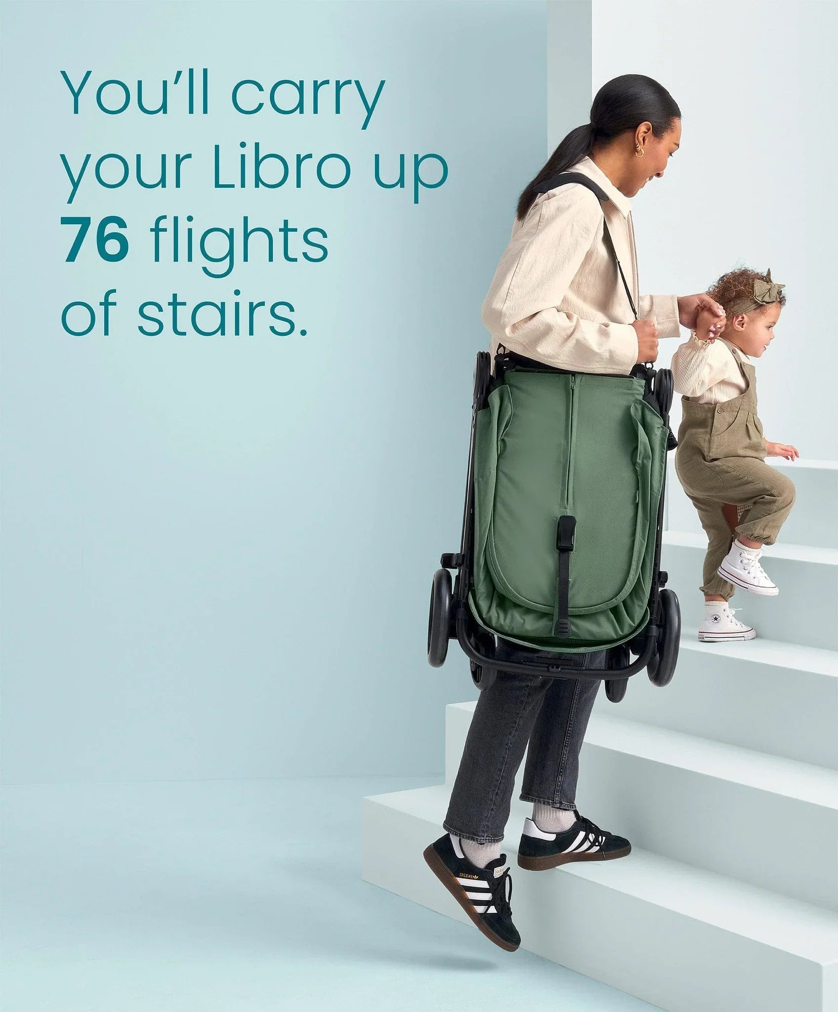 Folded Mamas and Papas Libro Stroller in Bay Green with lay-flat seat recline feature