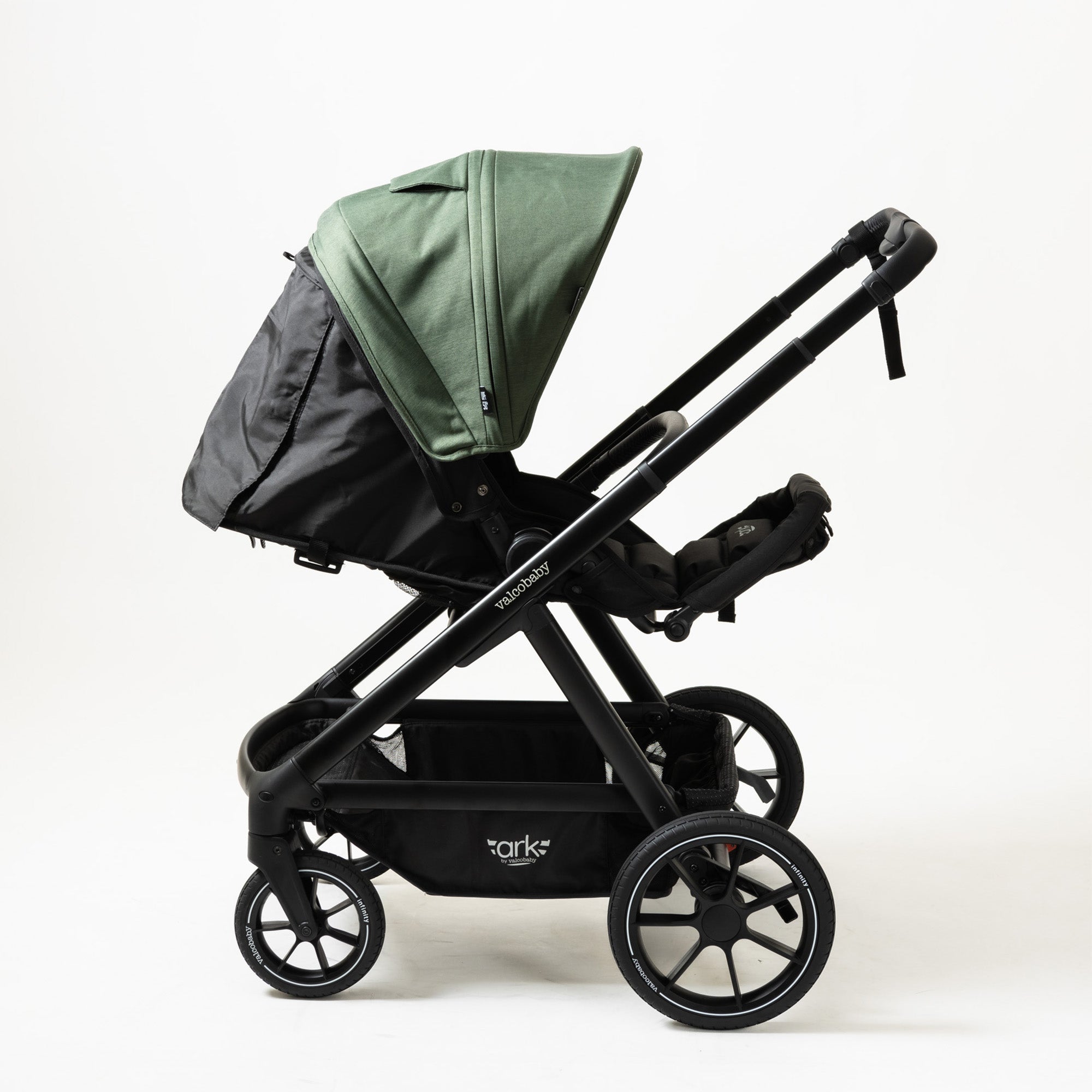 Black stroller with green canopy from Valcobaby ARK Joey Seat Bundle for Toshi Baby