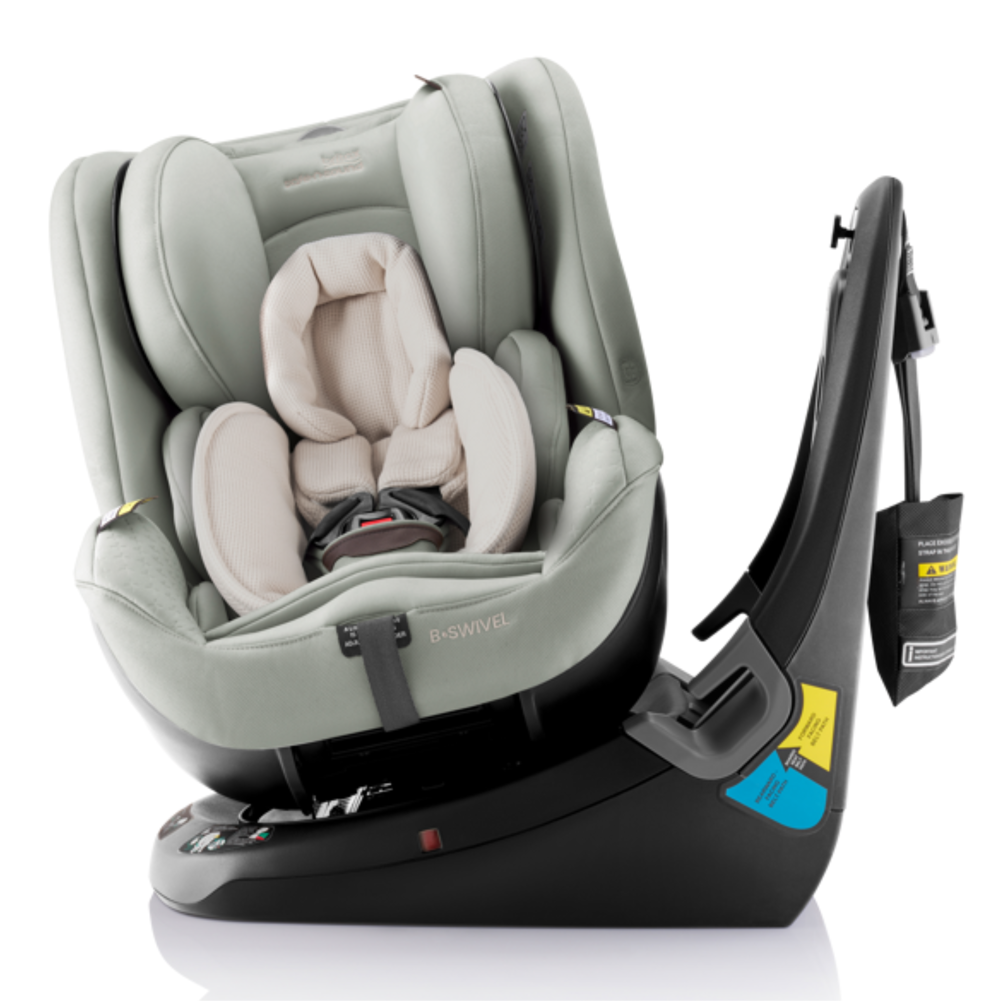 A Basiwel infant car seat in a light sage green fabric with a cream-colored inner lining, shown in a side-impact angle on a black base against a white background.